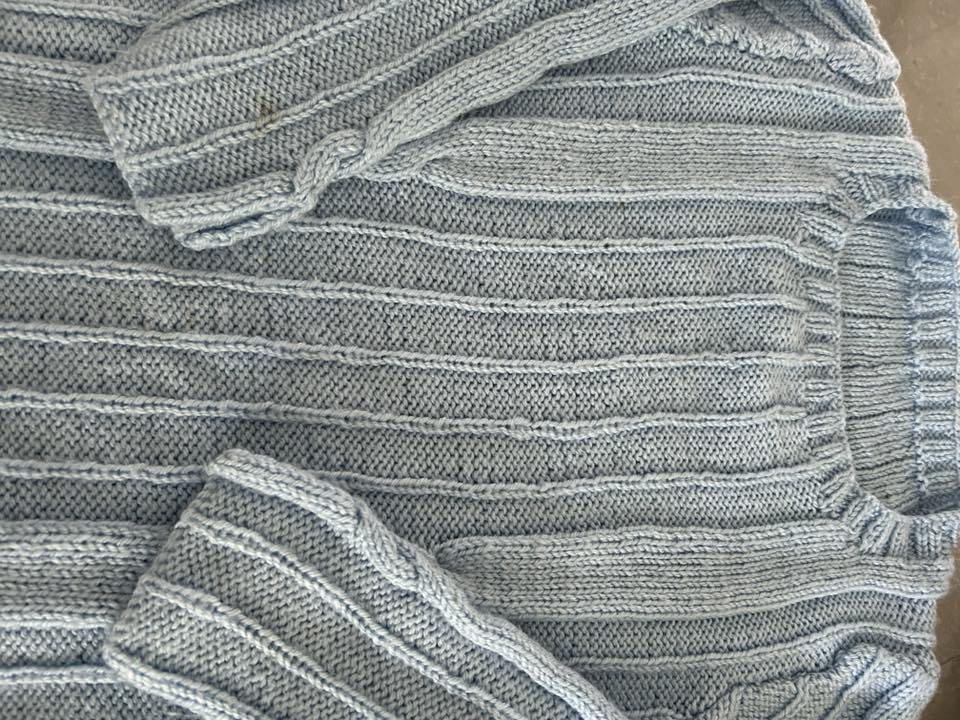 Hand‑knitted cabled jumper crafted by Swindon Big Knit, March 2026