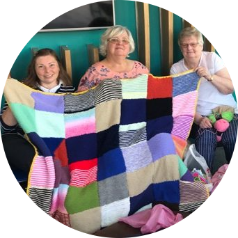 Swindon Big Knit volunteers crafting and making blankets for vulnerable and elderly people in the community